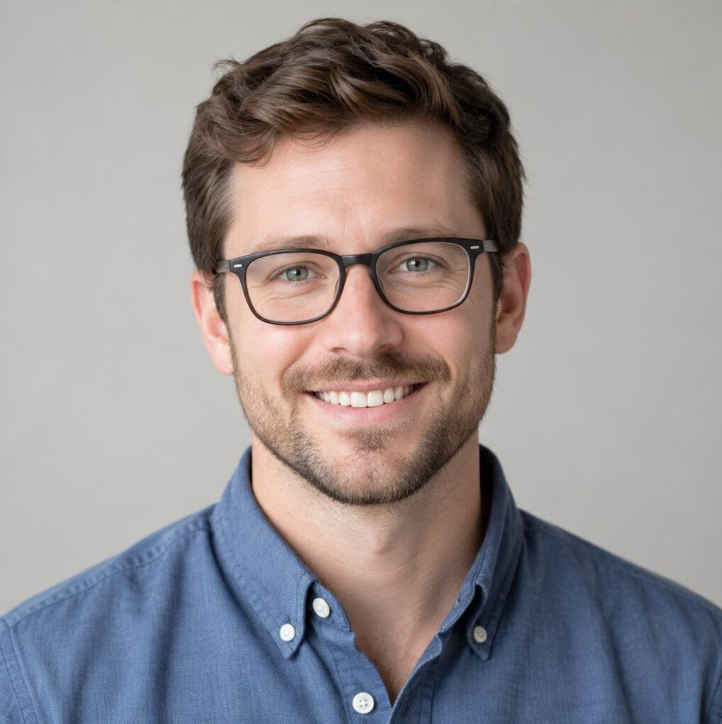 Portrait of a young man with glasses smiling
